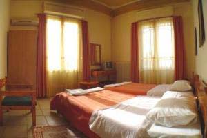 Basic double with city view, balcony, private facilities (shower), and breakfast